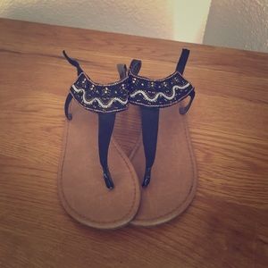 Maurice’s beaded sandals.